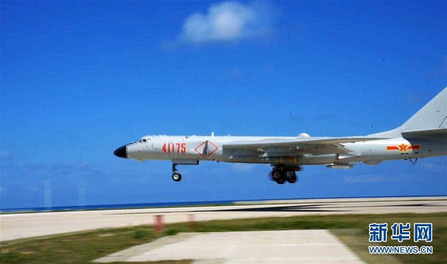 (圖文互動(dòng))空軍轟-6K戰(zhàn)機(jī)島礁起降訓(xùn)練提升海上實(shí)戰(zhàn)能力
