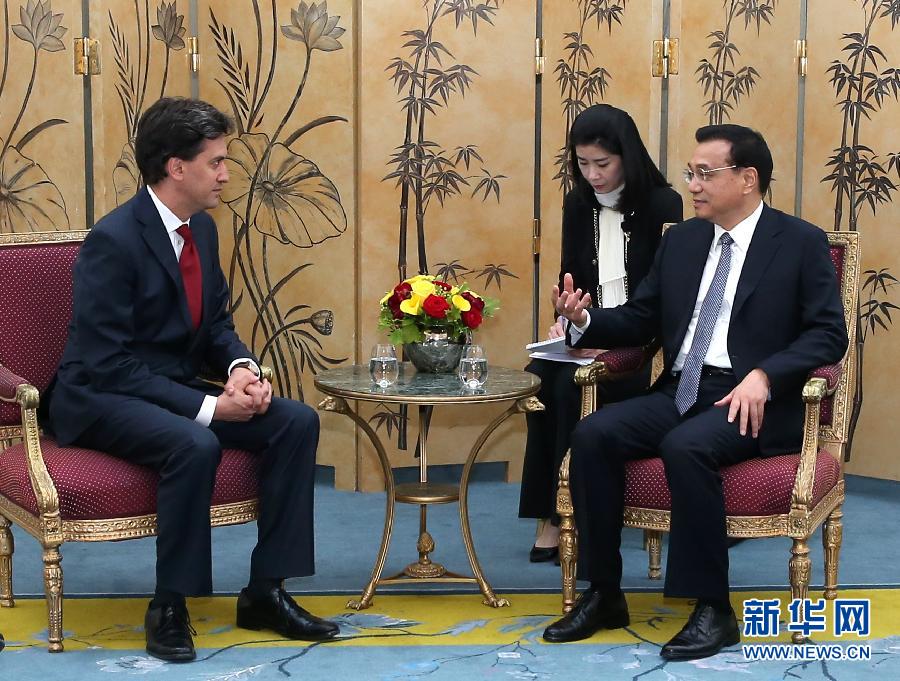 6月18日，國務(wù)院總理李克強在倫敦會見英國工黨領(lǐng)袖埃德&middot;米利班德。新華社記者 龐興雷 攝