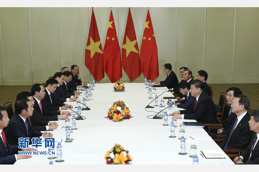 11月19日，國家主席習近平在利馬會見越南國家主席陳大光。新華社記者 龐興雷 攝 