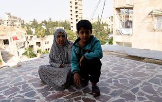 上學(xué)夢何處安放&mdash;&mdash;敘利亞女孩阿明娜的危樓生活